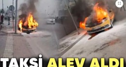 Taksi alev aldı