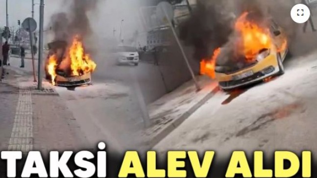 Taksi alev aldı